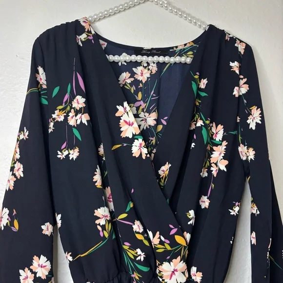 Honey Punch Women Navy Floral Long Sleeve Ruffle Romper - Picture 9 of 10